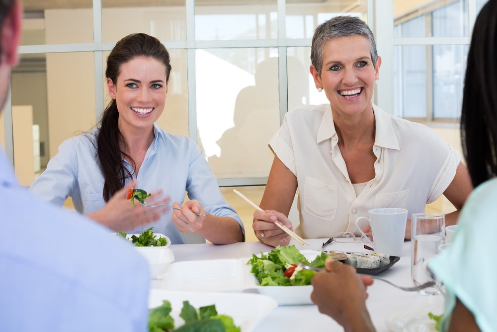 Women Eating salad Lunch